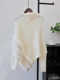 Irregular turtleneck sweater